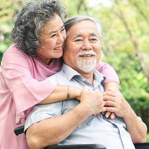 older couple hugging