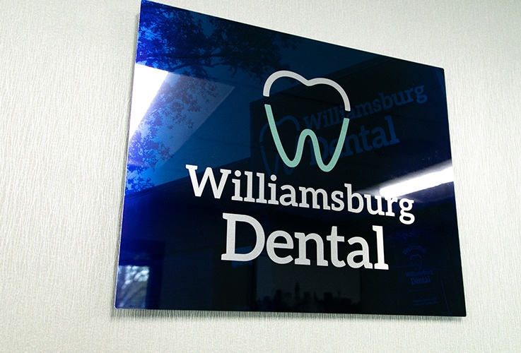 Williamsburg Dental sign on interior of dental office buidling