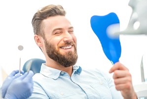 man mirror smiling