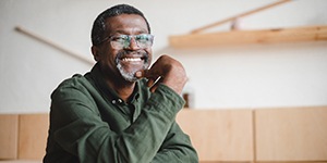 man enjoying his dental implants in Lincoln