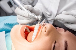 Patient receiving teeth cleaning