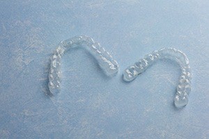 A pair of Invisalign aligner trays