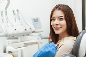 happy patient smiling in the dentist’s chair