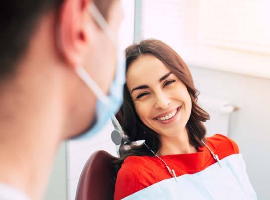 Smiling woman in dental chair