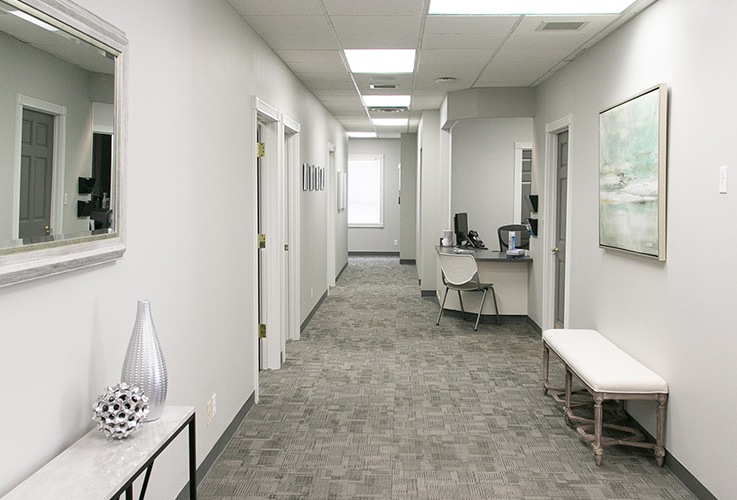 Hallway leading to dental office reception area