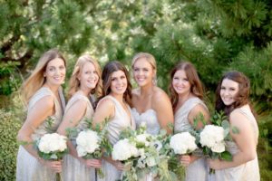Williamsburg Dental team member, Kristin, poses with bridesmaids