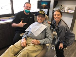 The Williamsburg dentists seeing a patient.