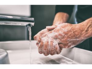 dentist in Lincoln washing hands