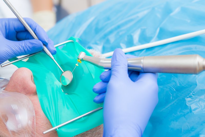 a patient undergoing a second root canal to fix problems that occurred after the initial procedure