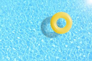 yellow floaty in a pool